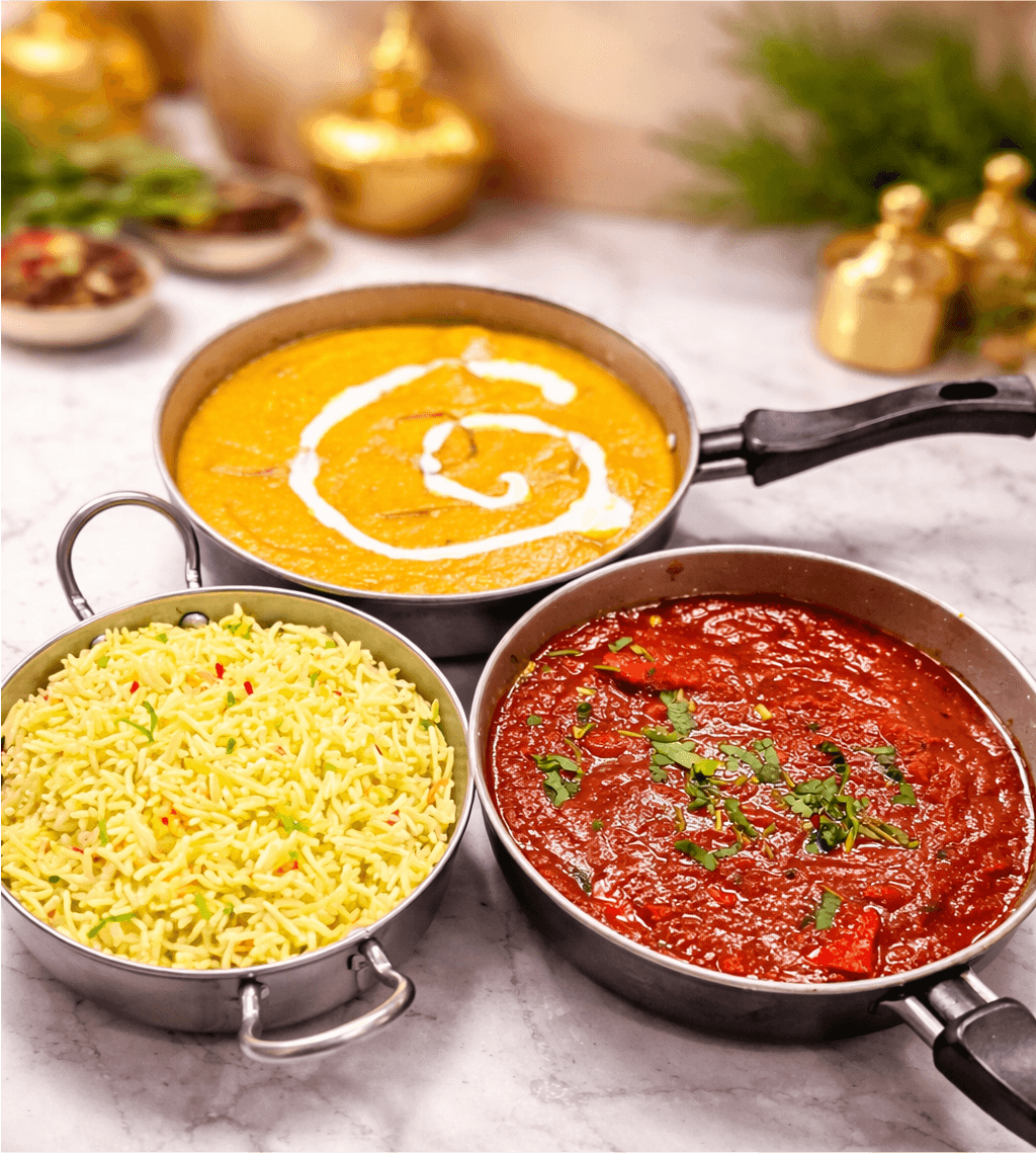 Creamy curry plated with herbs and sauce detail